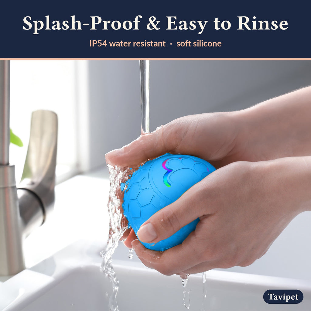 Rinsing the splash-proof Zoomie Ball under a tap
